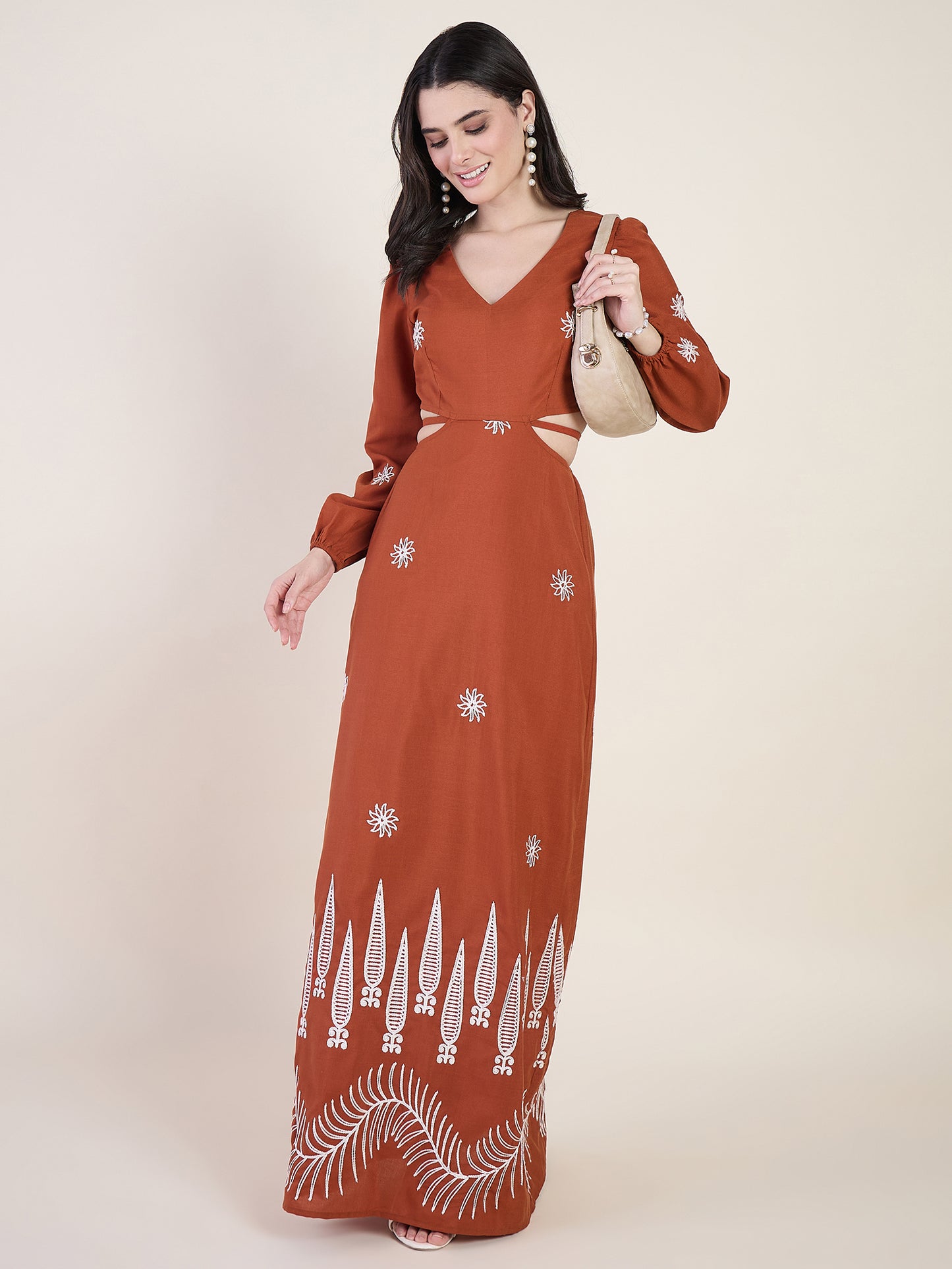 Embroidered maxi dress with floral charm in rust colour