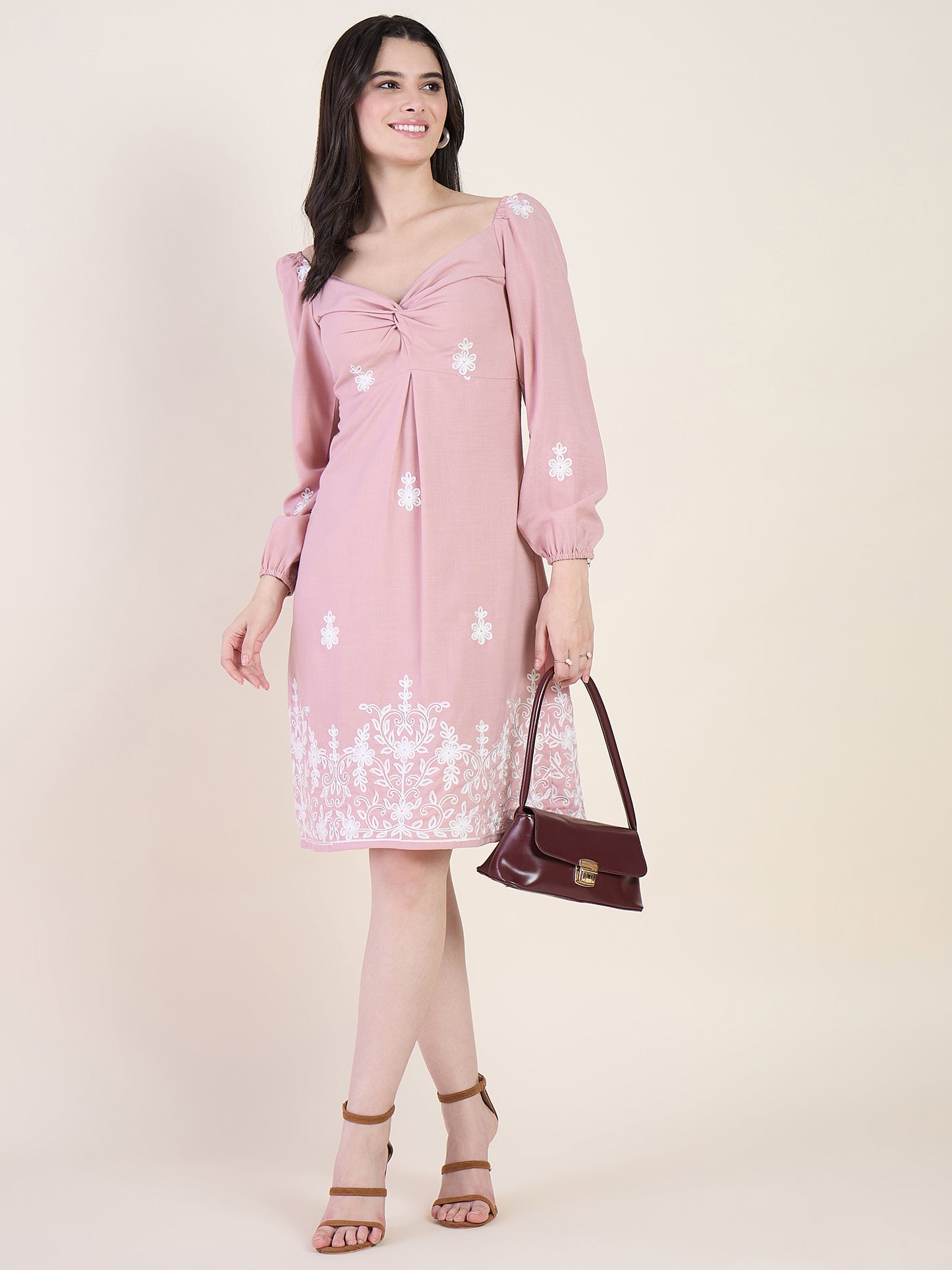 Embroidered A-line dress in pink colour