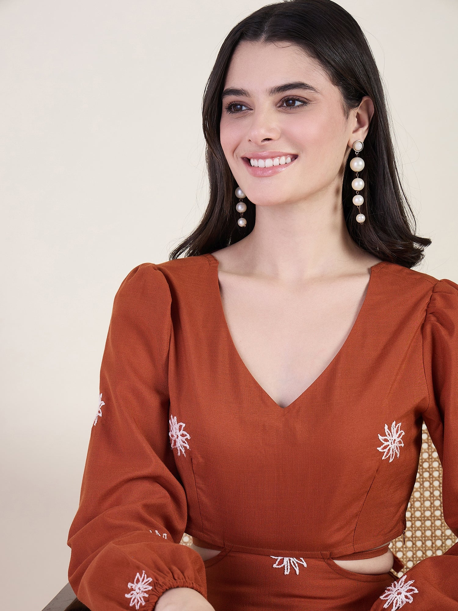 Embroidered maxi dress with floral charm in rust colour