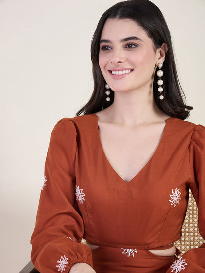 Embroidered maxi dress with floral charm in rust colour