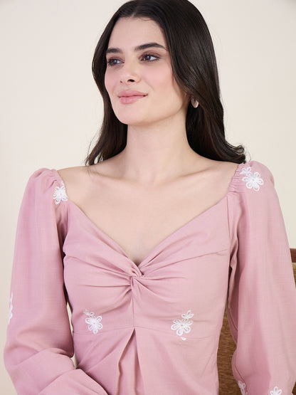 Embroidered A-line dress in pink colour