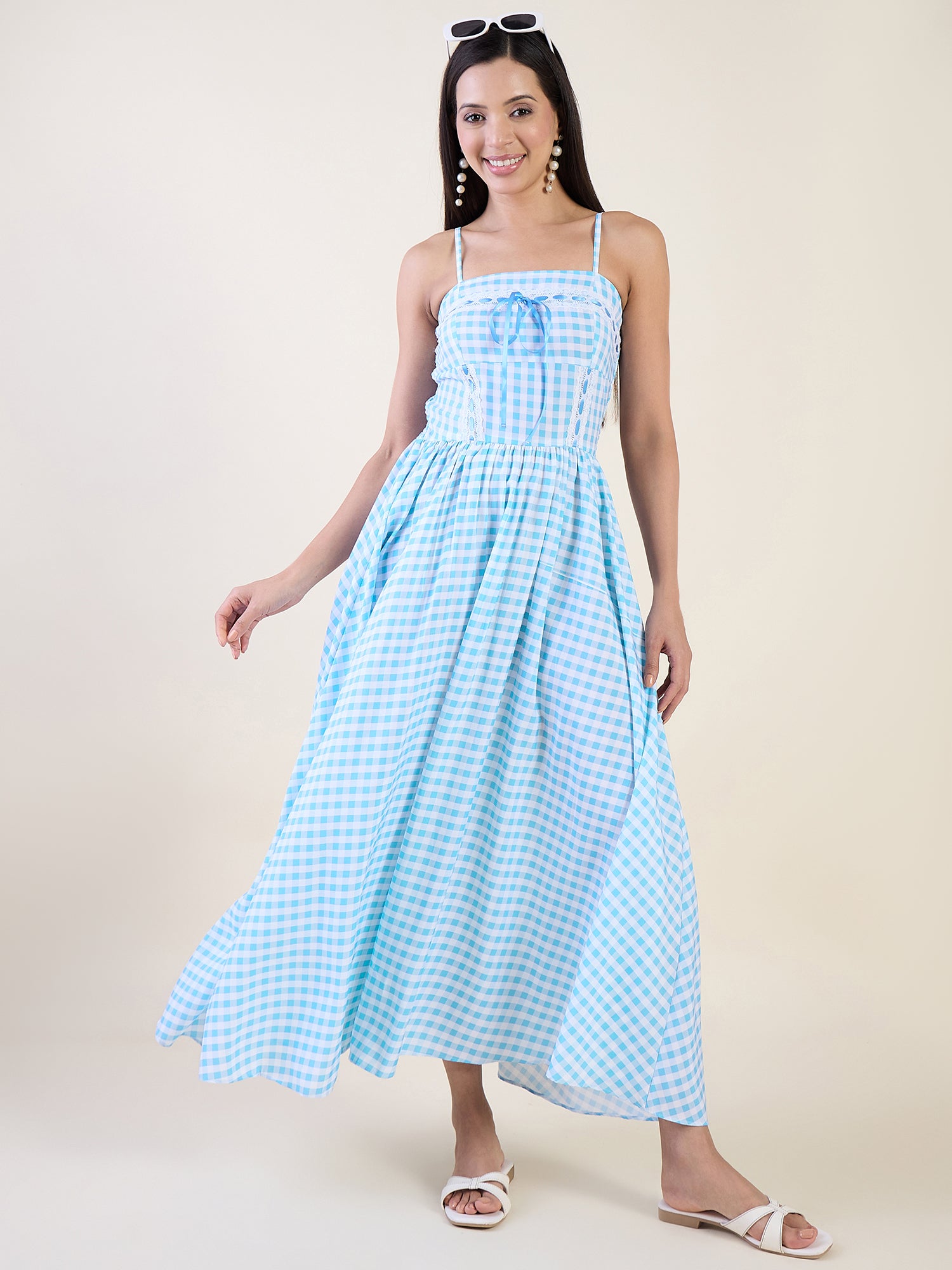 Embrace timeless charm with this gingham maxi dress in blue colour