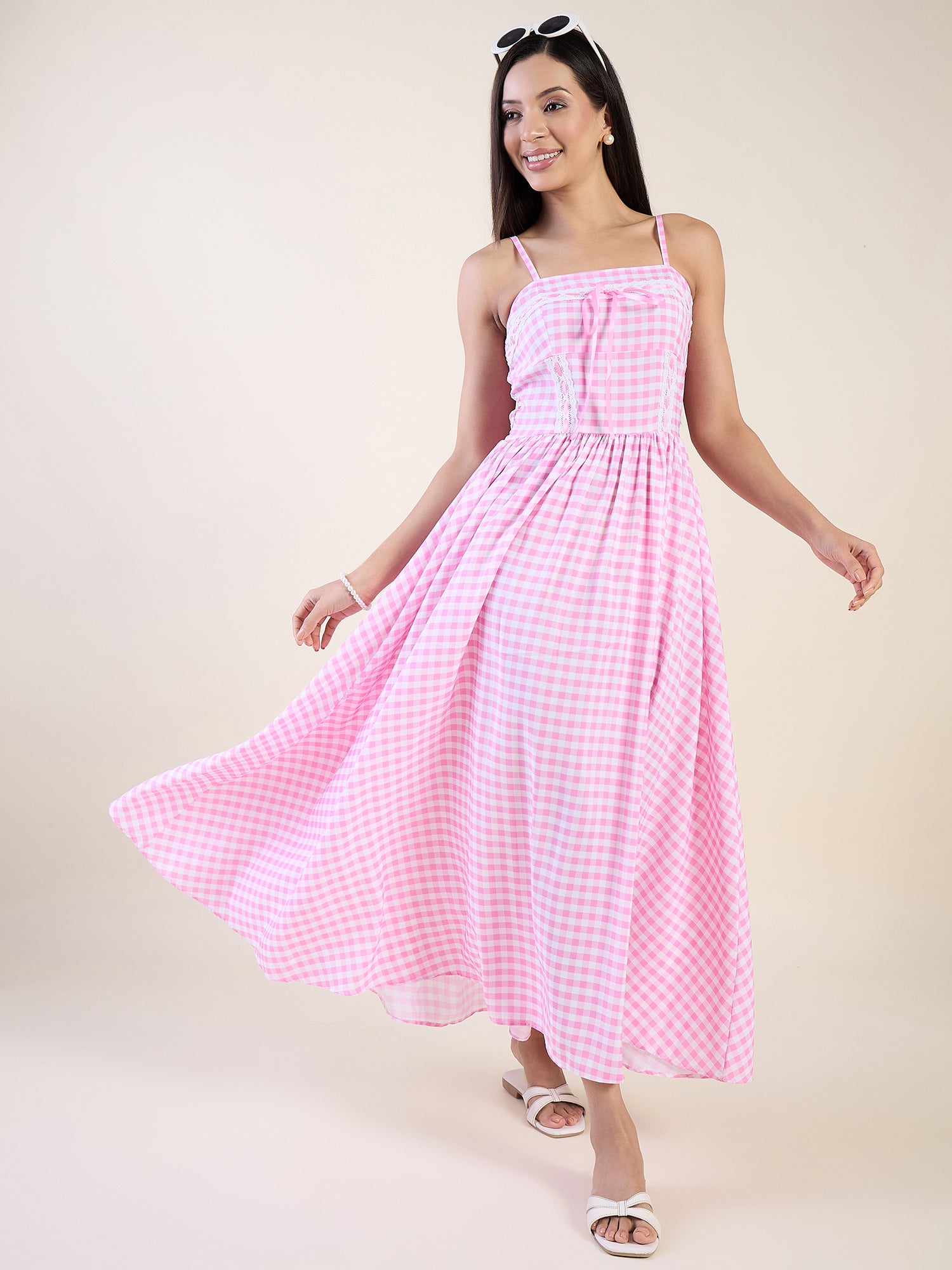 Embrace timeless charm with this gingham maxi dress in pink colour