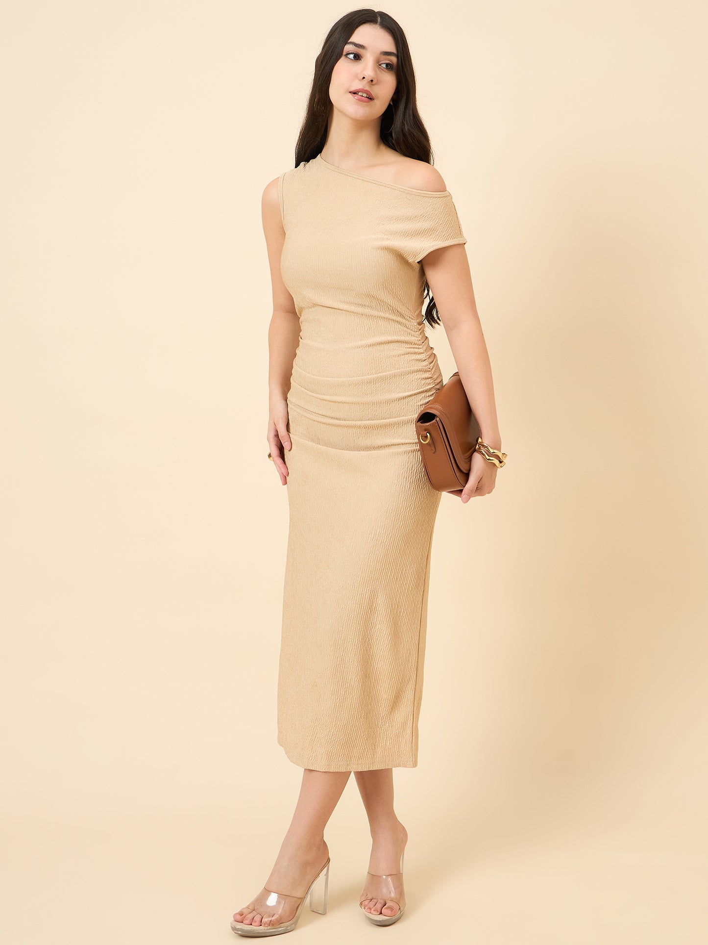 one-shoulder bodycon cream midi on pink background
