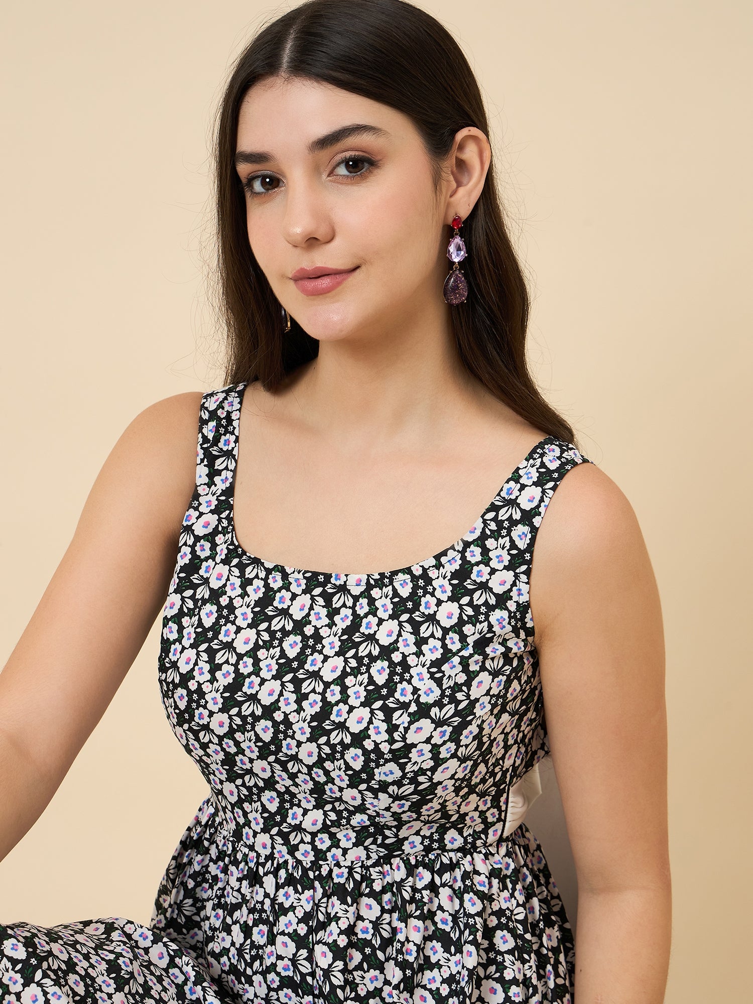 Black sleeveless floral A-line midi