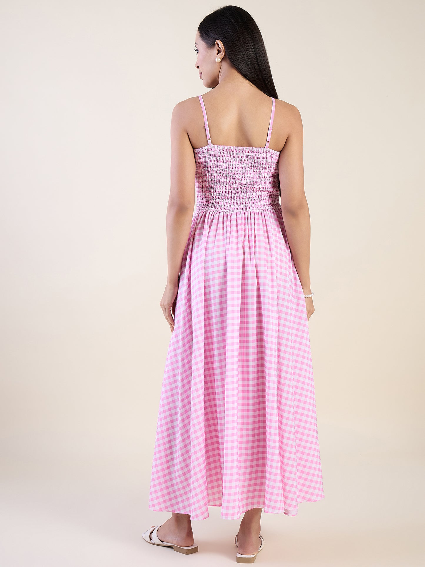 Embrace timeless charm with this gingham maxi dress in pink color.
