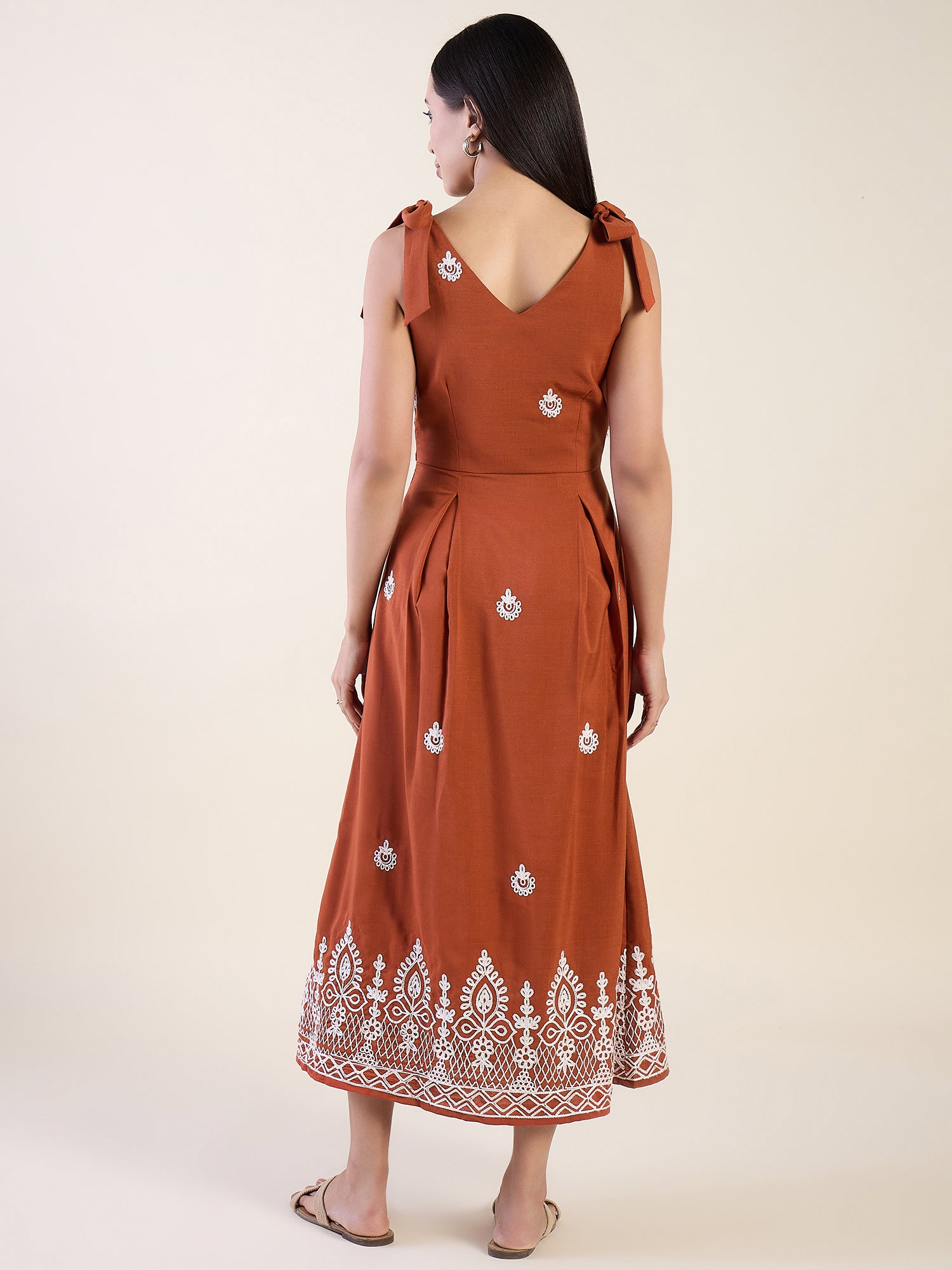 Embroidered midi dress in rust colour
