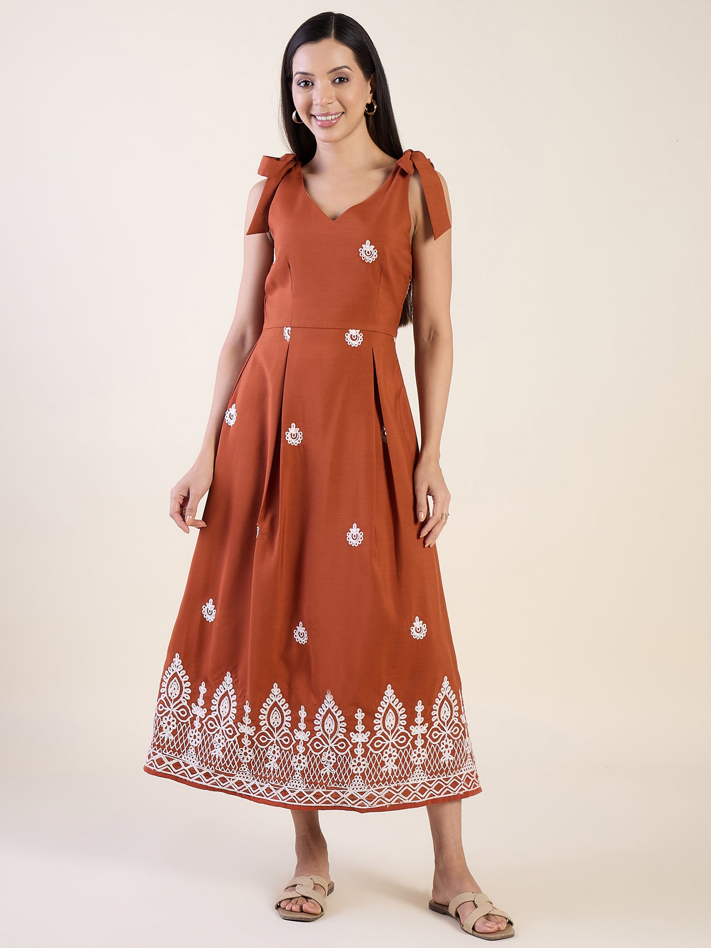Embroidered midi dress in rust colour