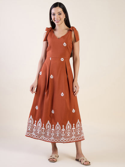 Embroidered midi dress in rust colour