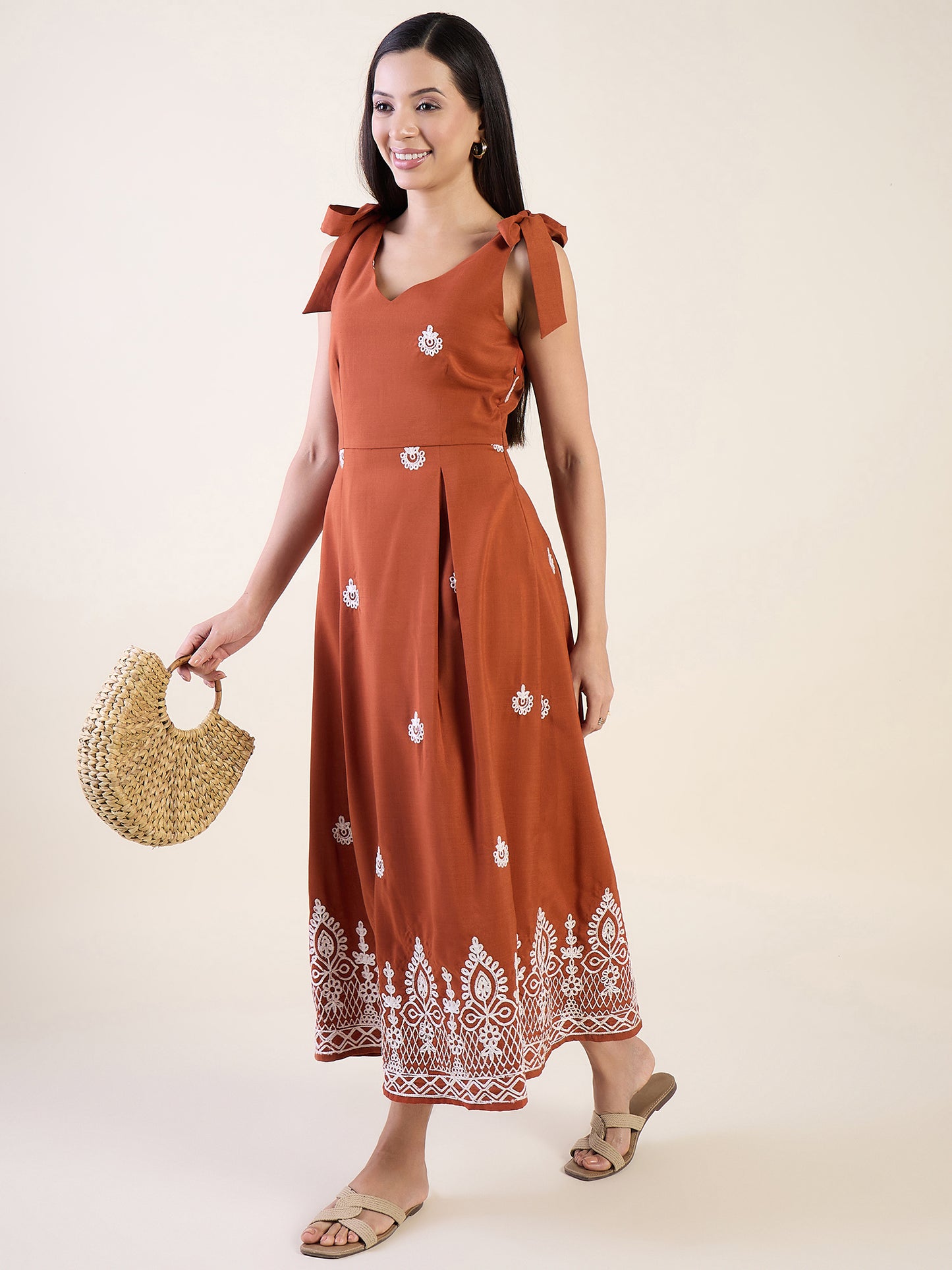 Embroidered midi dress in rust colour