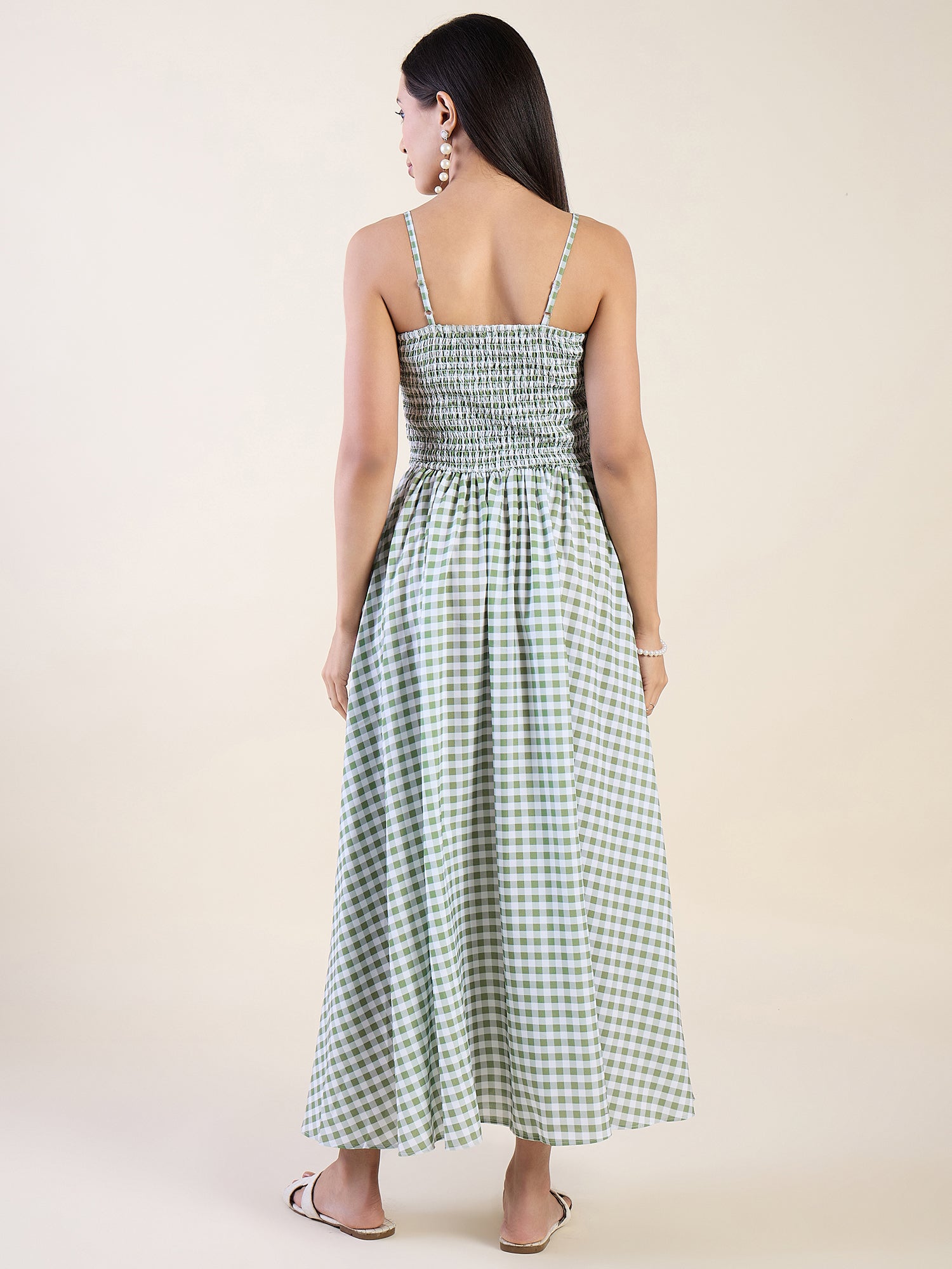 Embrace timeless charm with this gingham maxi dress in green color.