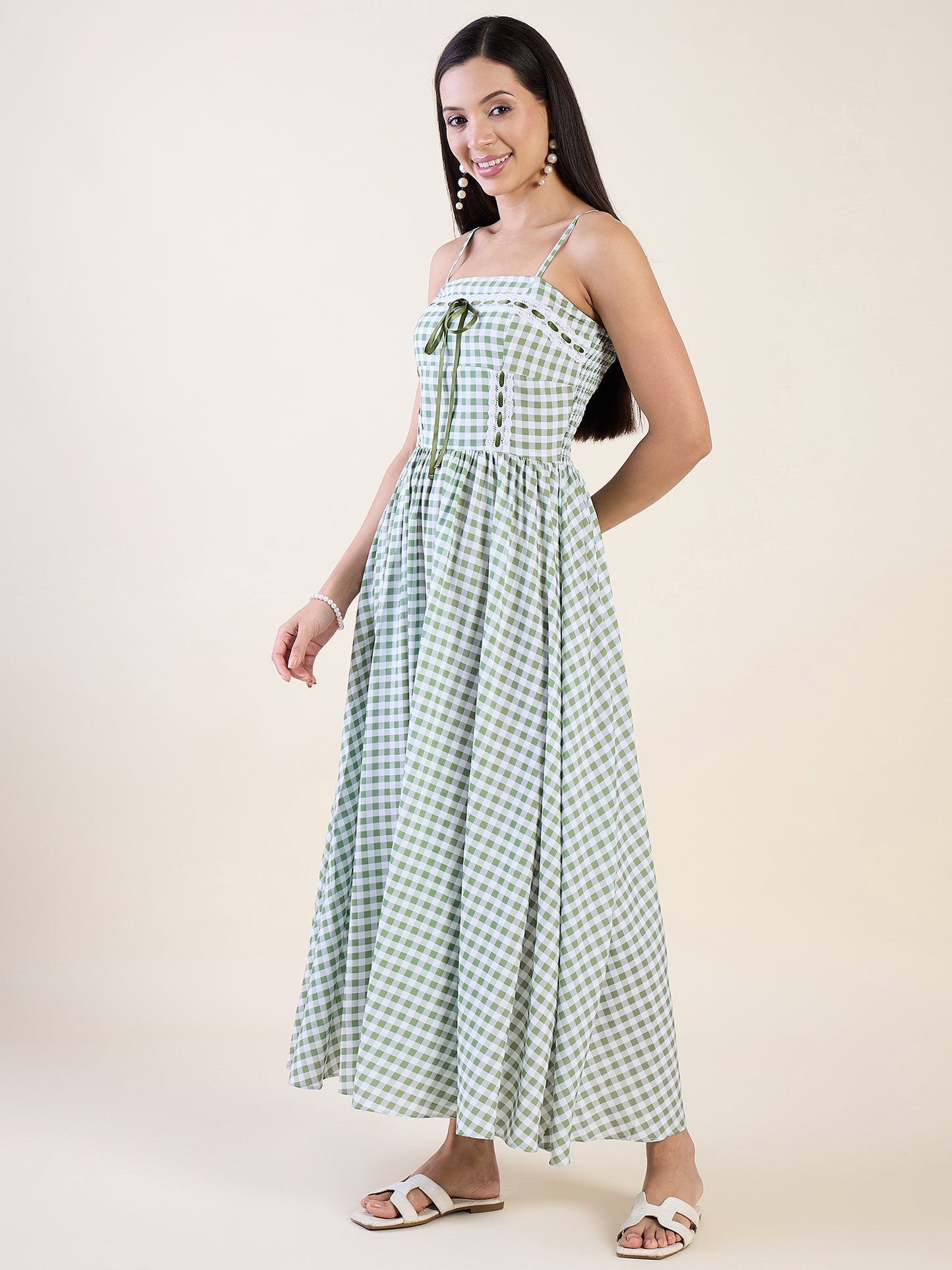 Embrace timeless charm with this gingham maxi dress in green color.