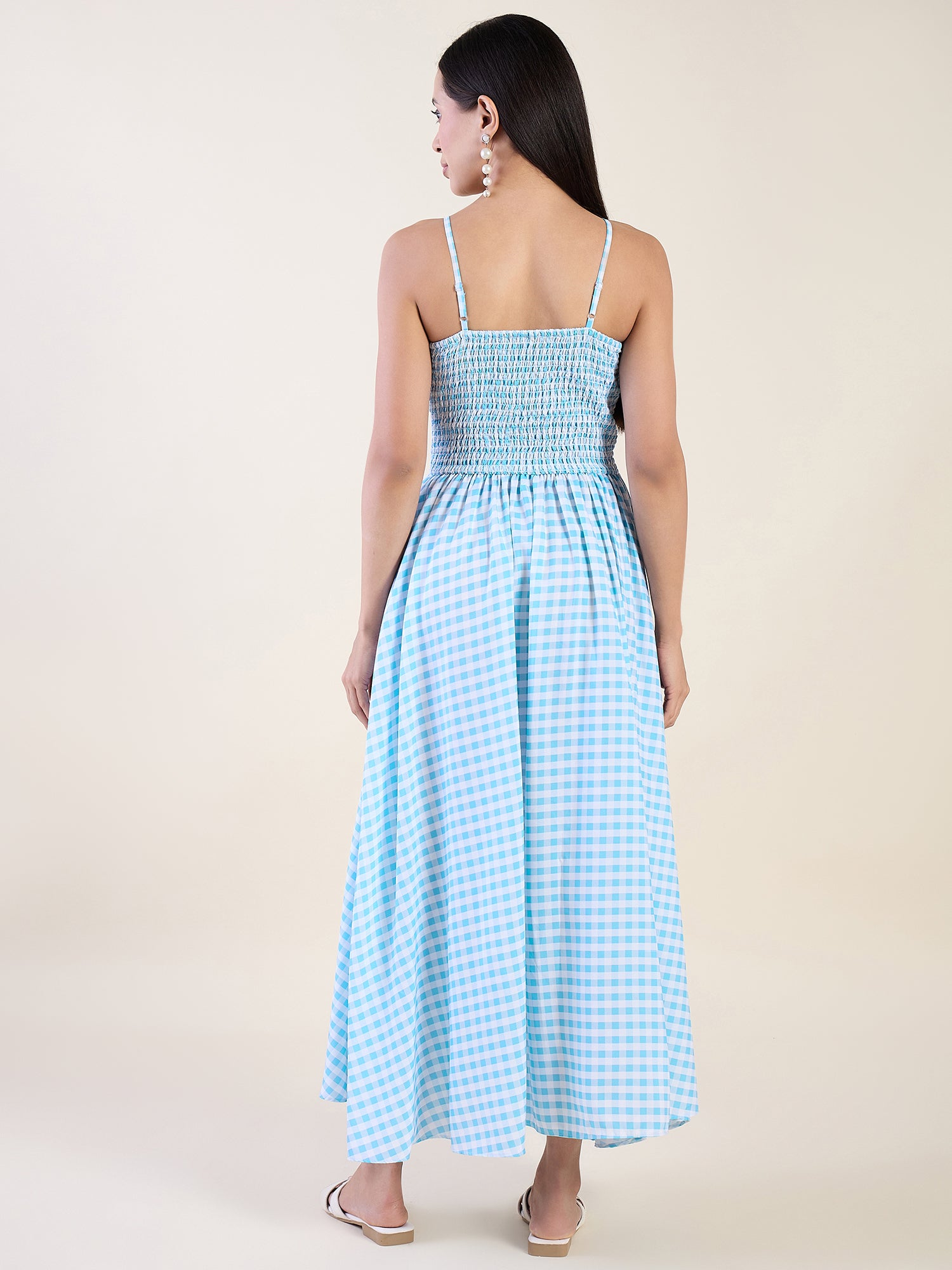 Embrace timeless charm with this gingham maxi dress in blue colour
