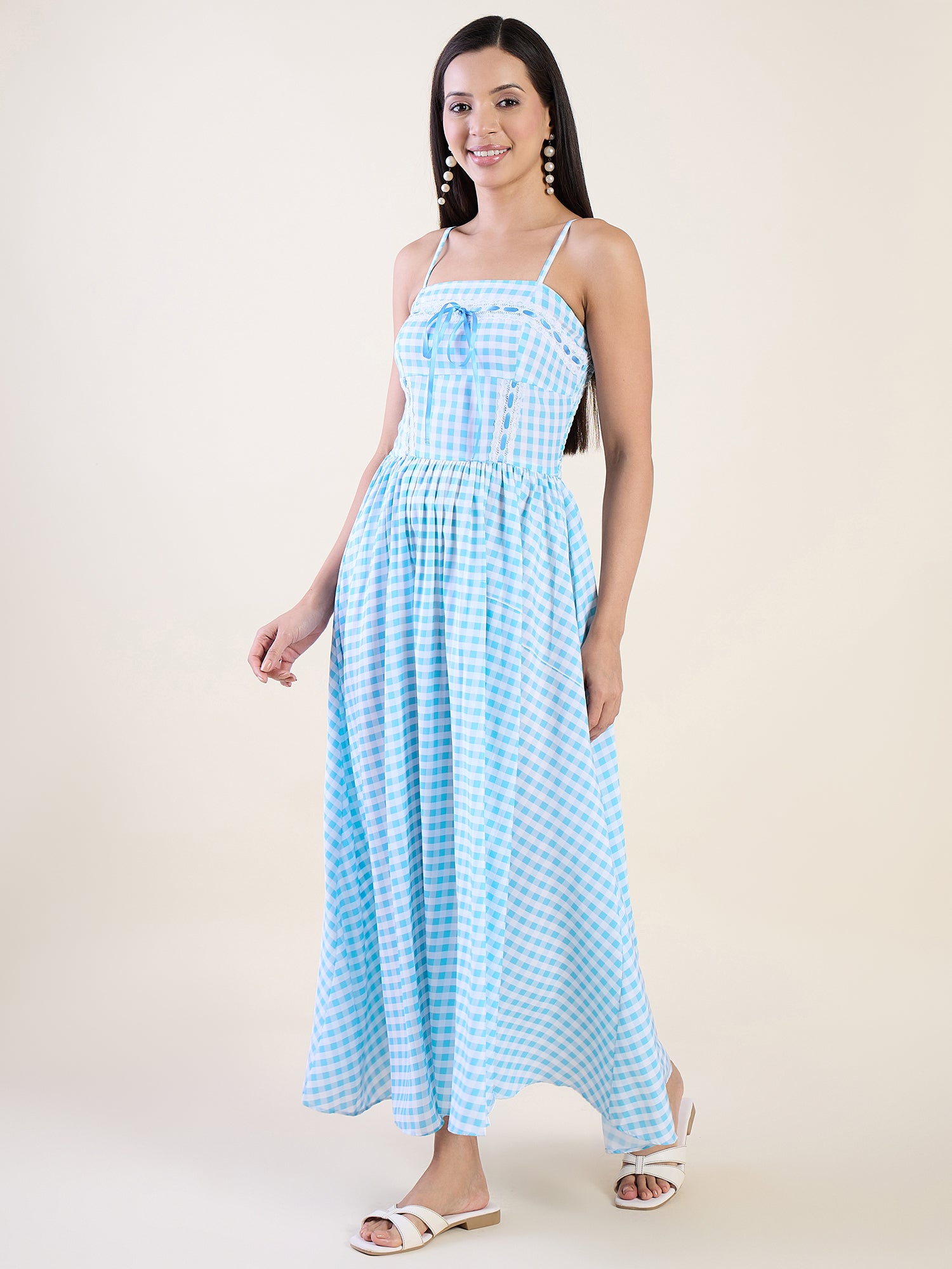 Embrace timeless charm with this gingham maxi dress in blue colour