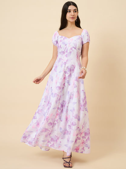 Woman wearing a floral dress on a beige background