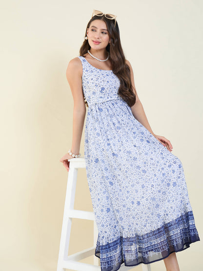 Woman wearing a blue floral dress on a white background