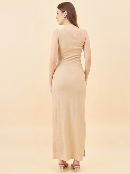 Woman wearing a cream one-shoulder dress against a beige background