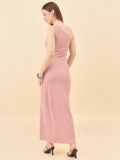 Woman wearing a pink one-shoulder dress on a beige background