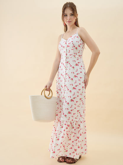 Woman wearing a floral dress holding a woven bag on a beige background