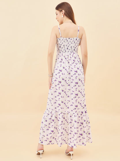 Woman wearing a floral dress on a beige background