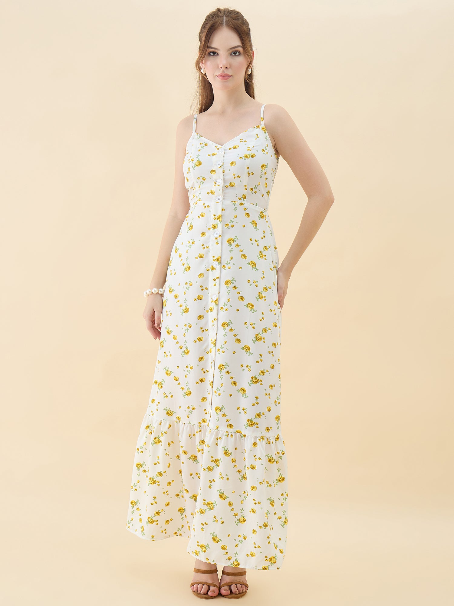 Woman wearing a white floral dress on a beige background