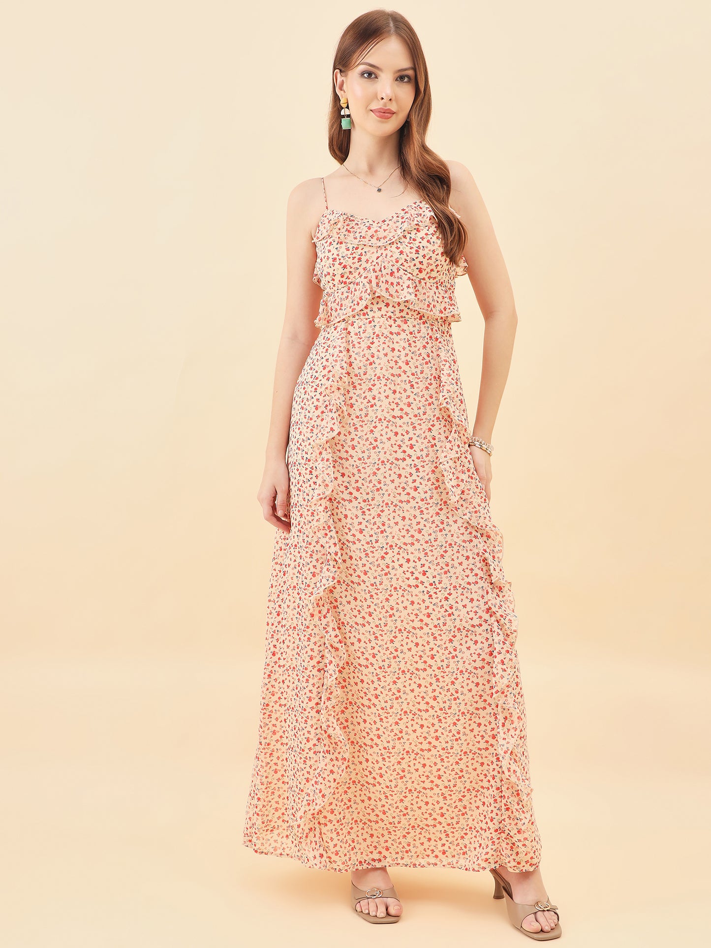 Woman wearing a floral dress on a beige background