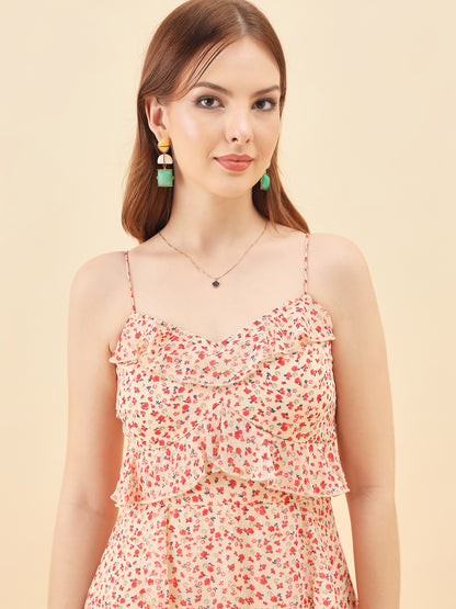 Woman wearing a floral dress with a plain background