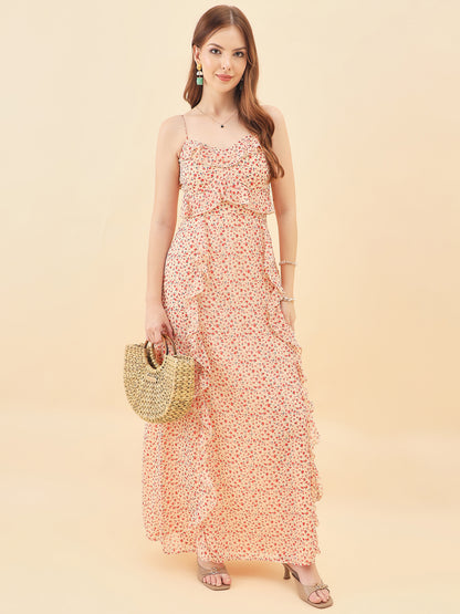 Woman wearing a floral dress holding a straw bag against a beige background